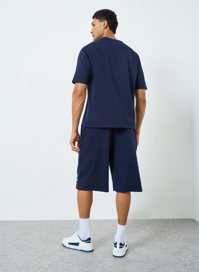 ستايلي طقم تي شيرت وشورت رجالي بطبعة بسيطة بقصة واسعة - Image 5